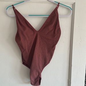 shimmery body suit